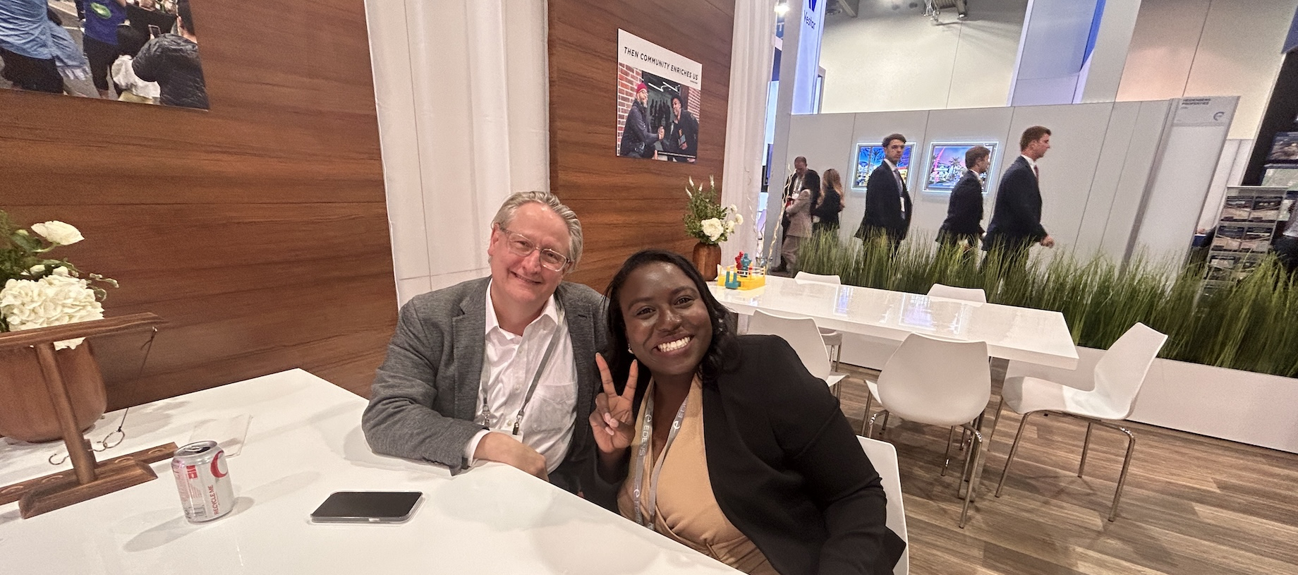 Edens’ Emalia Tamanikwa and Bill Caldwell at the Edens booth during ICSC LAS VEGAS in May 2024