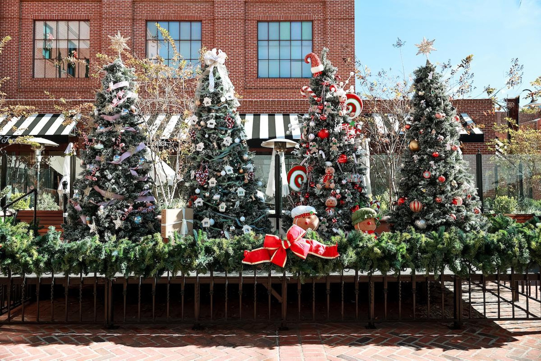 Nonprofits and tenants decorated holiday trees at ShopCore properties. Shoppers voted for their favorites, and winning nonpro